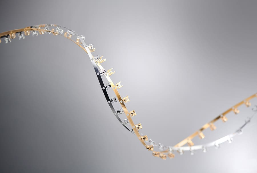 A close-up view of advanced stamping technology showcasing metallic components.